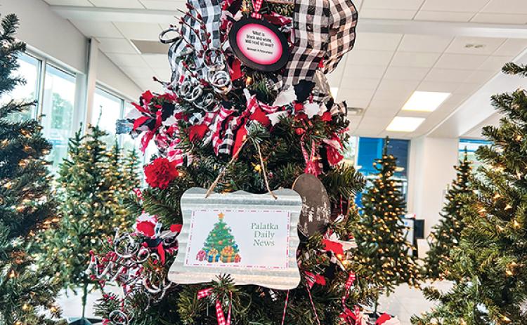 SARAH CAVACINI/Palatka Daily News – Pictured is the Palatka Daily News’ entry into this year’s Festival of Trees that will take place at Beck Chevrolet Buick GMC, 1601 Reid St. in Palatka. There is still time to sponsor a tree in hopes of it being raffled for a good cause.