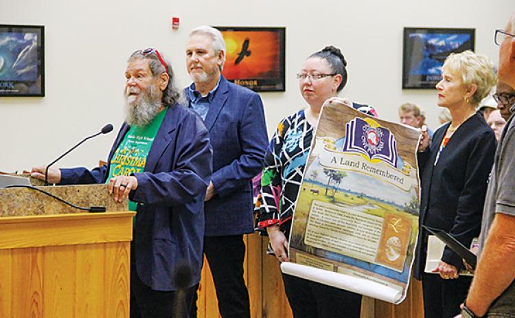SARAH CAVACINI/Palatka Daily News – Stephen Crowley, a member of the One Book One Putnam Committee, tells the Putnam County Board of Commissioners why reading is important.