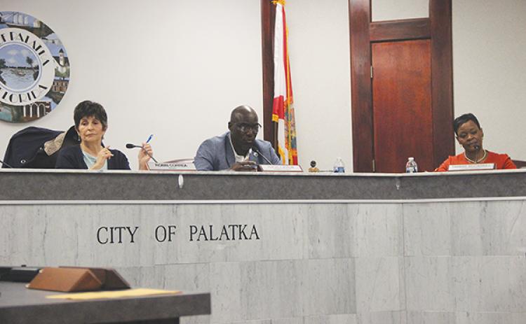 SARAH CAVACINI/Palatka Daily News – From left, Palatka Mayor Robbi Correa and Commissioners Rufus Borom and Tammie McCaskill participate in a special-called meeting Thursday evening.