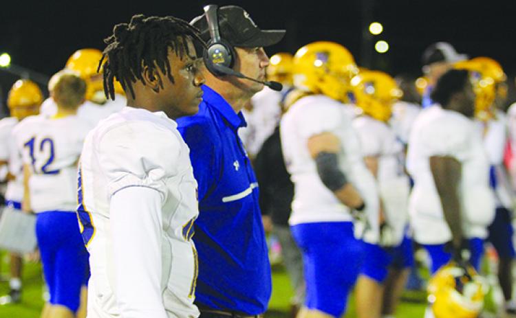 Palatka quarterback Tommy Offord (left) and coach Patrick Turner go into the postseason after losses to tough Bradford and St. Augustine. (MARK BLUMENTHAL / Palatka Daily News)