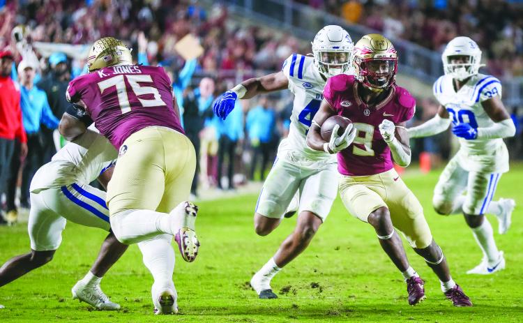 Lawrance Toafili, here scoring in the fourth quarter in the win against Duke, will not play in the Orange Bowl Saturday due to an injury. (GREG OYSTER / Special to the Daily News)