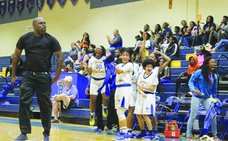 Palatka coach Craig Washington strikes a pose after watching his Panthers defeat Interlachen, 48-41, on Dec. 28, 2019 to win the Jarvis Williams Christmas Tournament. (MARK BLUMENTHAL / Palatka Daily News)