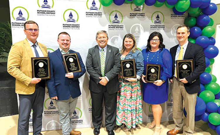 Photo courtesy of the Putnam County School District – From left, Joe Theobold, Ian Boze, Superintendent Rick Surrency, Alyse Crabtree, Leslie Smith and Michael Chaires stand together Tuesday after the 2024 Employees of the Year ceremony.