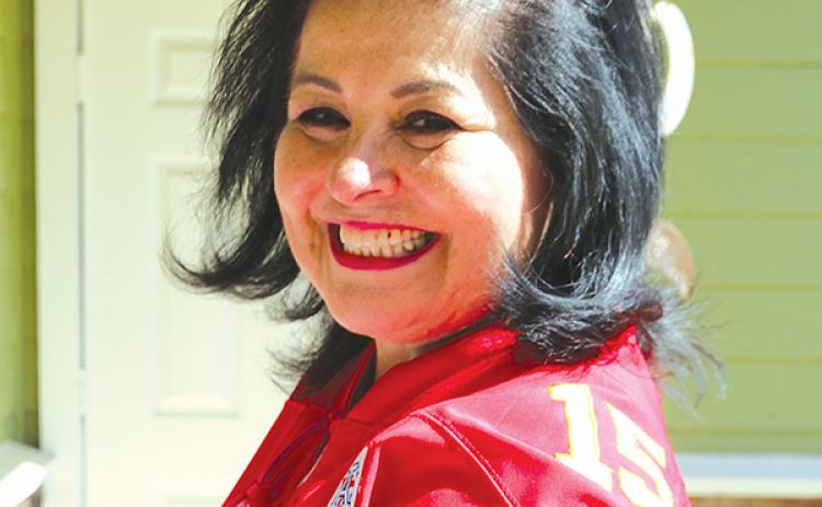 TRISHA MURPHY/Palatka Daily News – Mimi Alverez of Palatka shows her support of the Kansas City Chiefs ahead of the Super Bowl, during which time people will be collecting money and food to donate to charity.