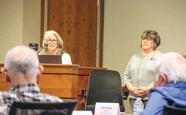 SARAH CAVACINI/Palatka Daily News – Tax Collector Linda Myers, left, and Deputy Tax Collector Brenda Bridges present information to the Bond Oversight Committee on Wednesday.