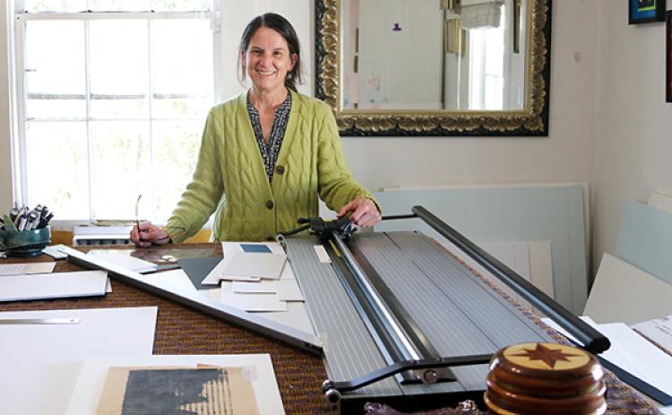 TRISHA MURPHY/Palatka Daily News – Owner and framer Gail Davis has her shop inside the Studios of Melrose, where she offers framing for area artists’ creations.