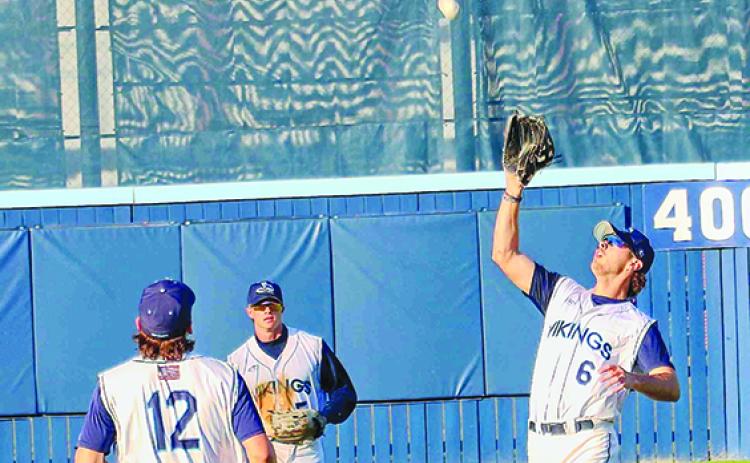St. Johns River State College right fielder Nathan Gagnon prepares to catch a fourth-inning flyball in front of second baseman Lucas Phelps and center fielder Michael Furry during Tuesday’s game against Santa Fe. (RITA FULLERTON / Special to the Daily News)