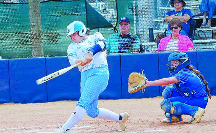 Princess Arredondo connects for a home run during a St. Johns River State College doubleheader sweep of Florida State College-Jacksonville on March 1 at home. (RITA FULLERTON / Special to the Daily News)